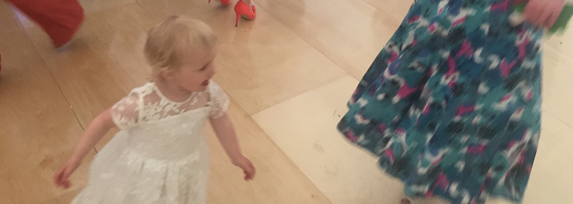 Elsa dancing at a wedding